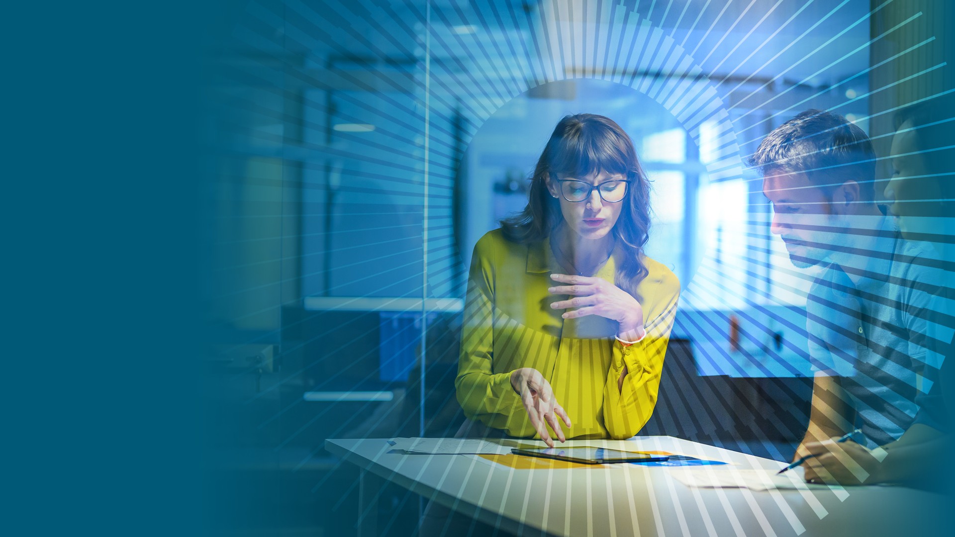 Woman and man reading global annual report 2025